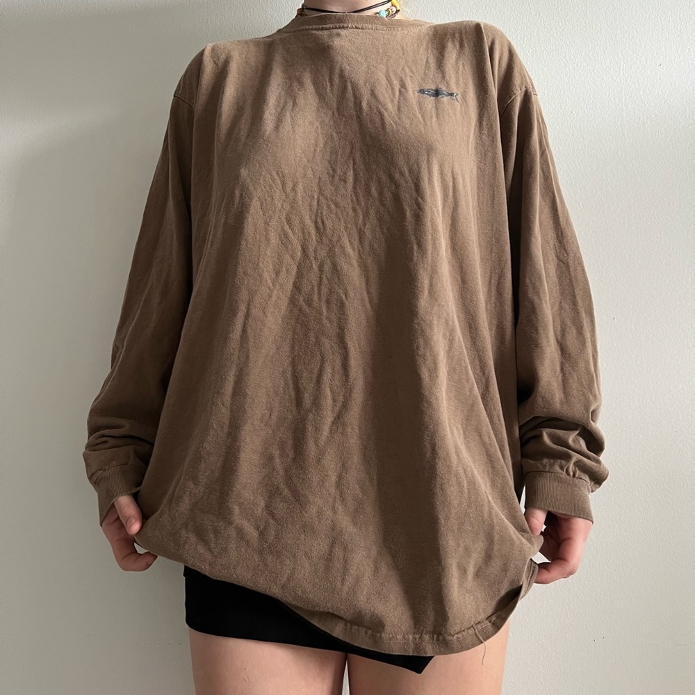 Brown shirt with a fish